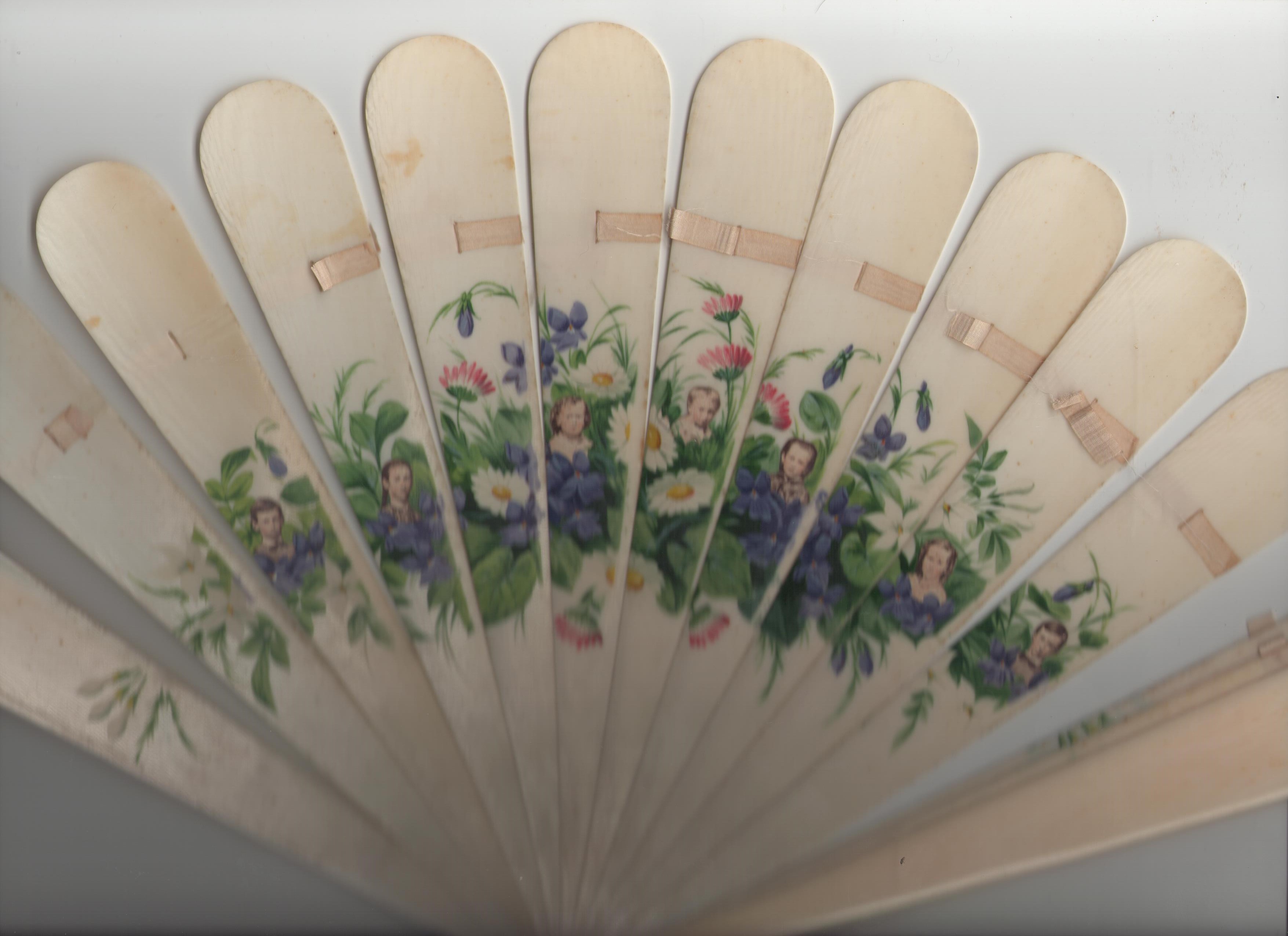 The seven children of Thomas and Ida (Wolff) May on a painted ivory fan in the possession of the family
